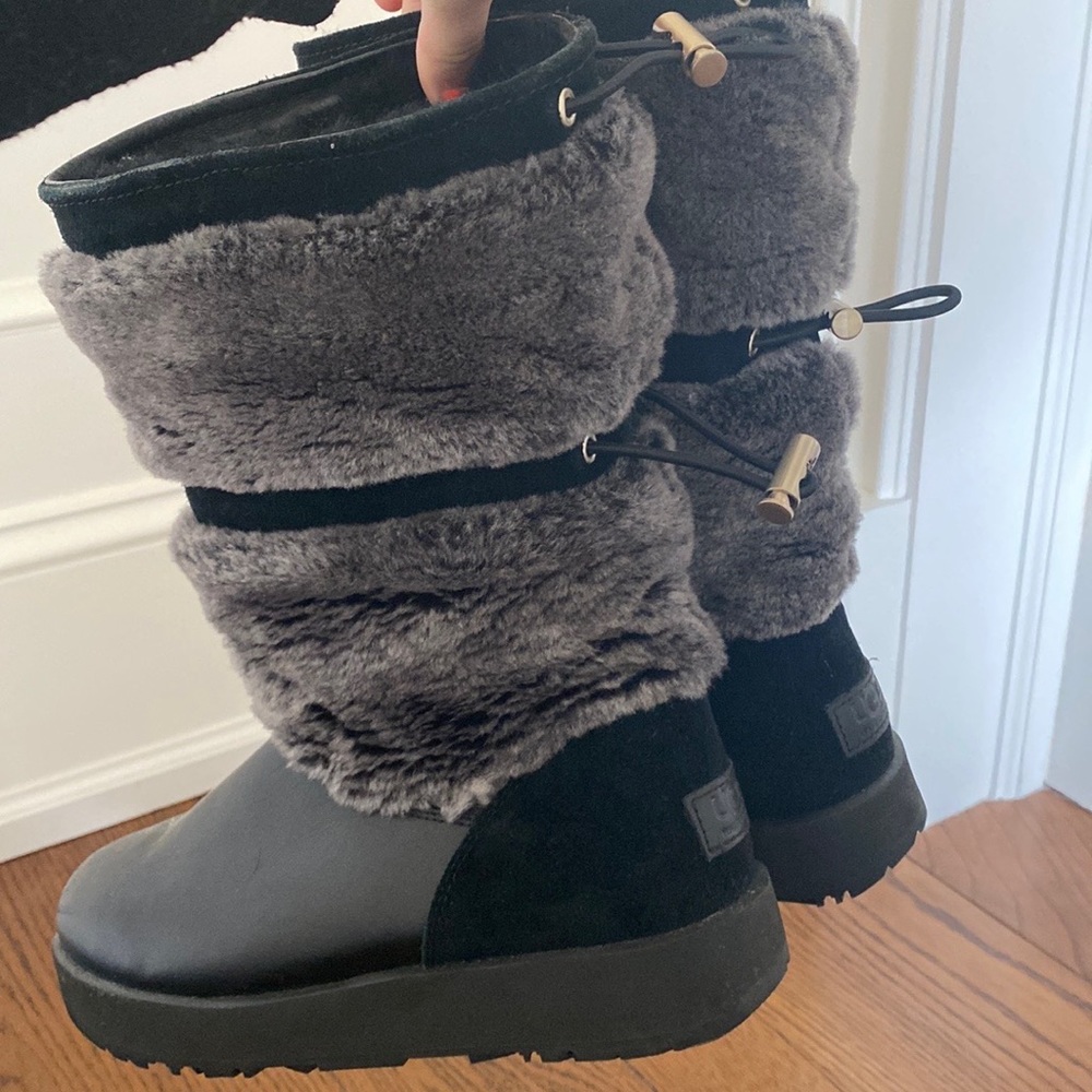 Black leather Uggs with fur on outside and inside